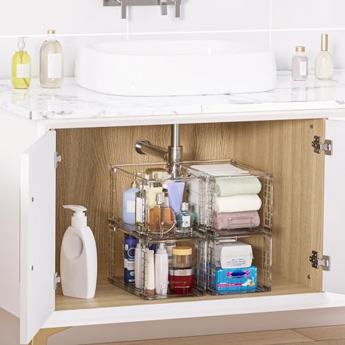 Clear stackable drawers organizing bottles inside a cabinet